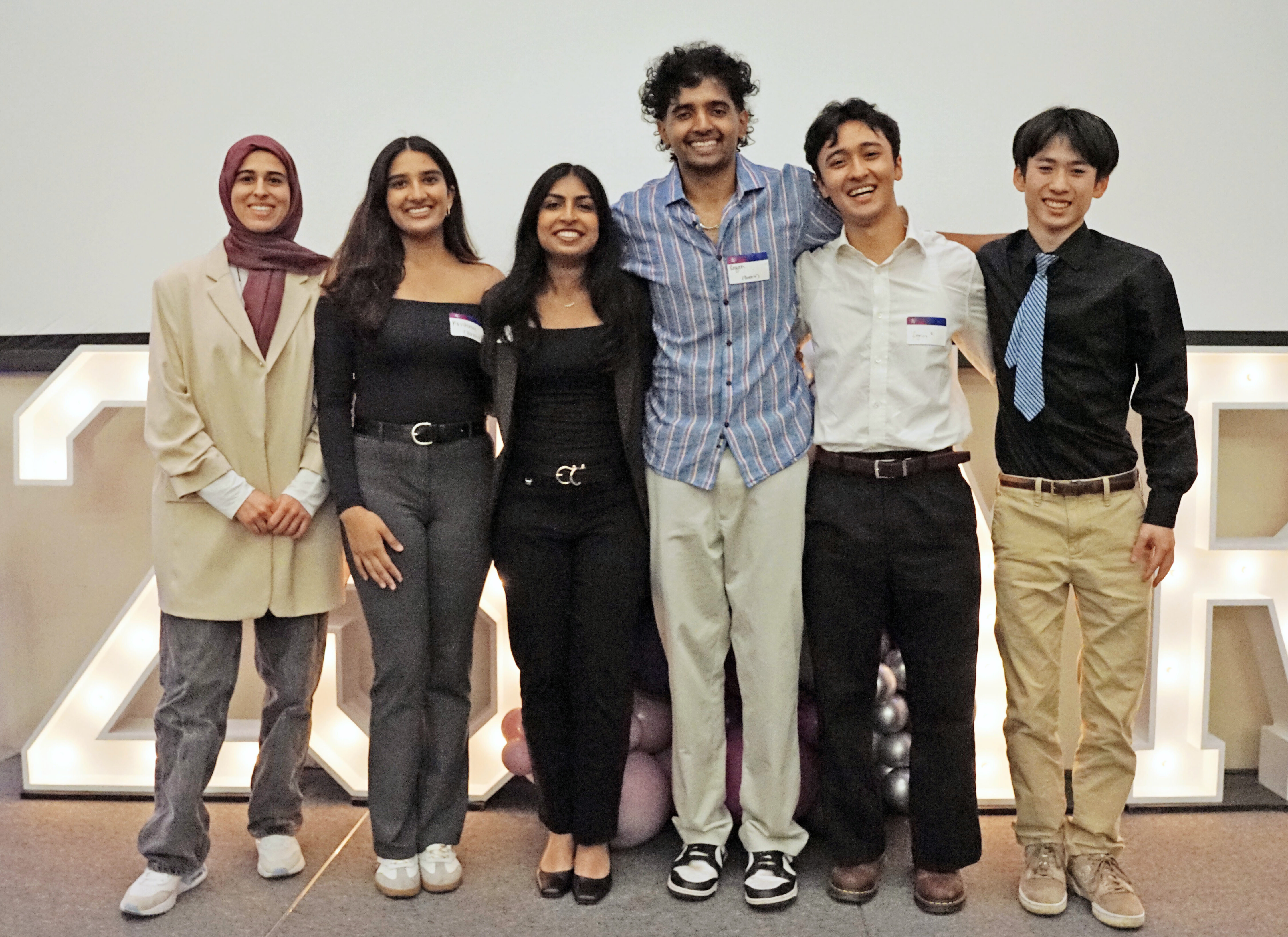 6 students stand side-by-side on stage at the 2025 Big Bang awards