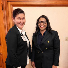 photo of two women in suits