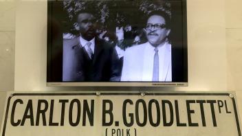 Street sign and video still for SF City Hall
