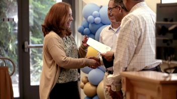 woman receives a certificate 