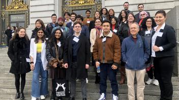 photo of a group of students and others on the steps of San Francisco's City Hall