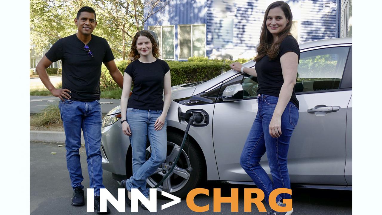 team of 1 man and 2 women standing in front of electric vehicle charging outdoors with text "INN>CHRG"