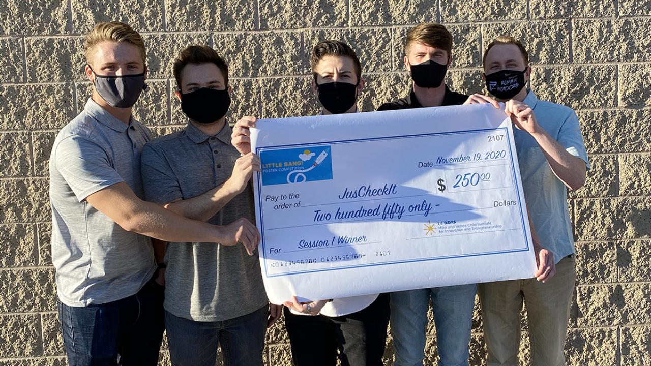five males wearing masks holding large check for little bang season 1 winner
