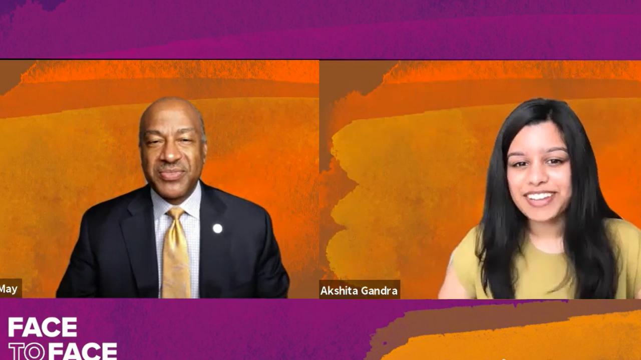 image of one male and one female talking with text "face to face with chancellor may akshita gandra uc davis student"