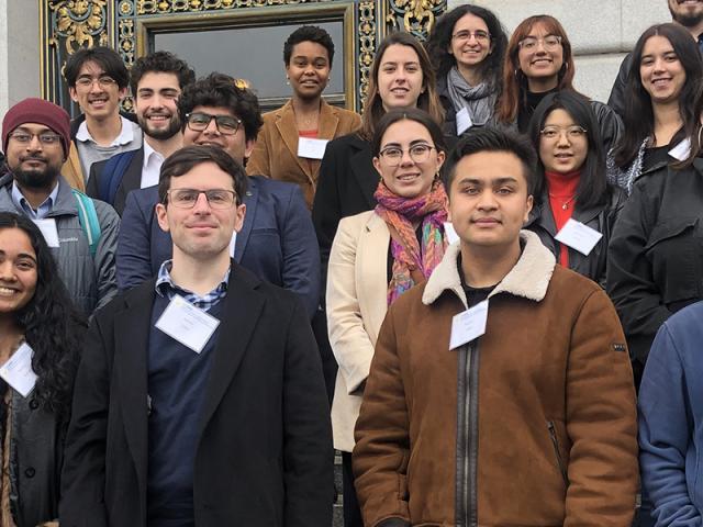 students standing on steps, SF City Hall, closeup