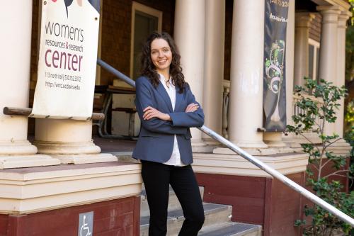 photo of a young woman outside a building